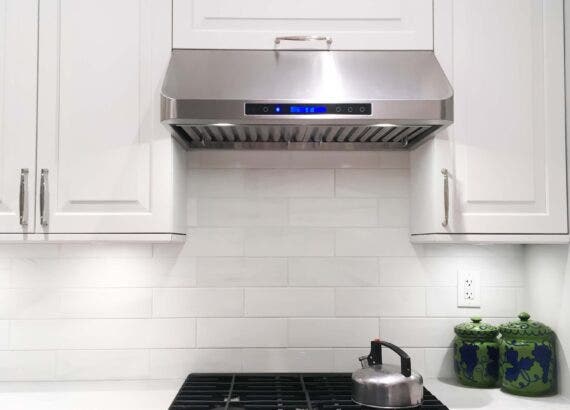 Proline Range Hood PLJW 113 with White cabinets and green jars