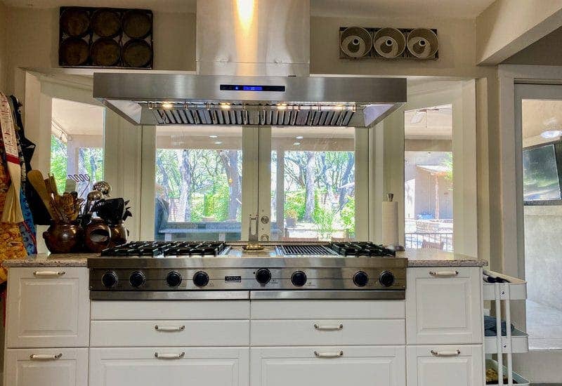 Island Range Hood over Stainless Cooktop