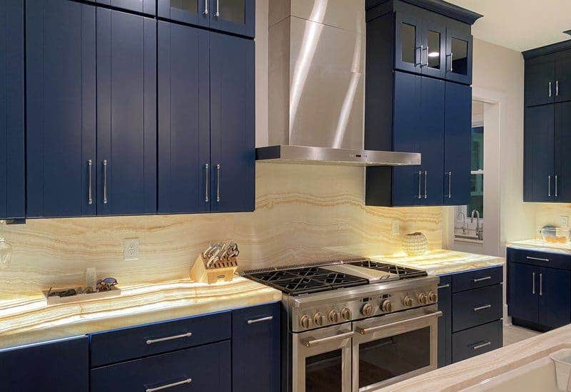 Wall Range Hood with Blue Cabinets