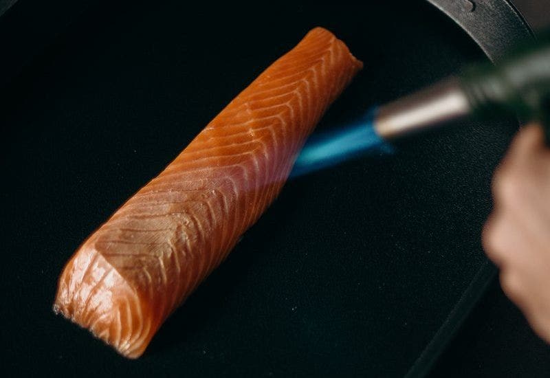 Using Butane Torch on Salmon