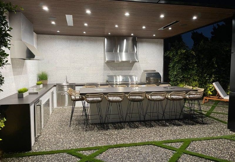 Two range hoods in large outdoor kitchen