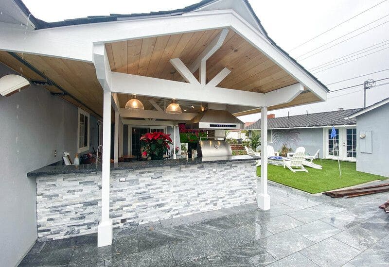 Outdoor Kitchen with a covered roof