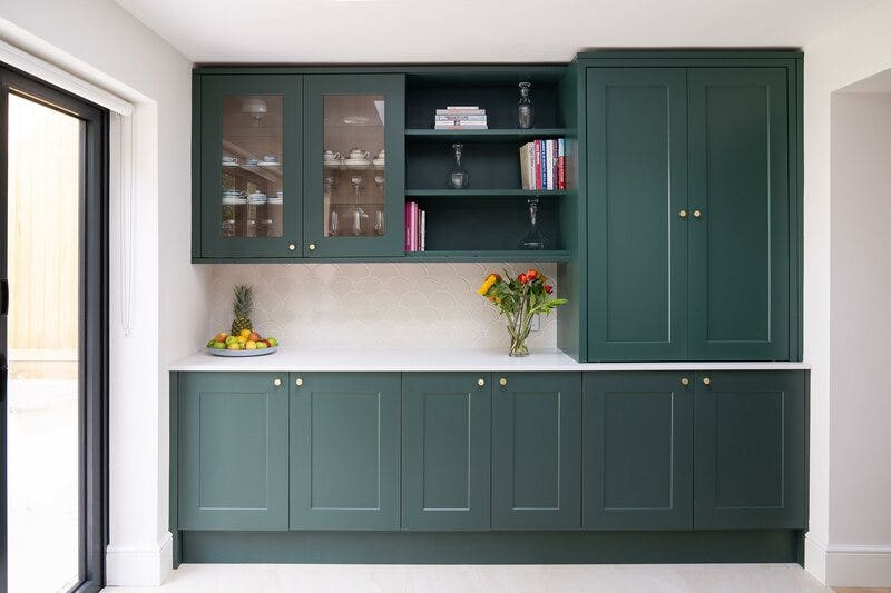 Dark green cabinets