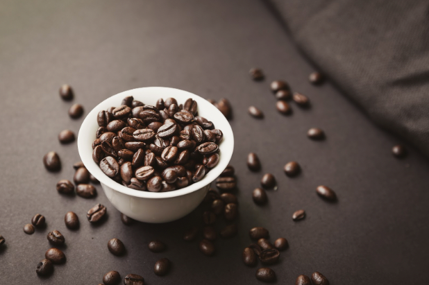 https://www.prolinerangehoods.com/blog/wp-content/uploads/2022/09/Bowl-of-Coffee-Beans.png