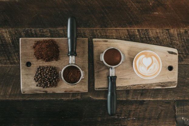 Wooden Coffee Station with ground coffee, whole beans, and latte art