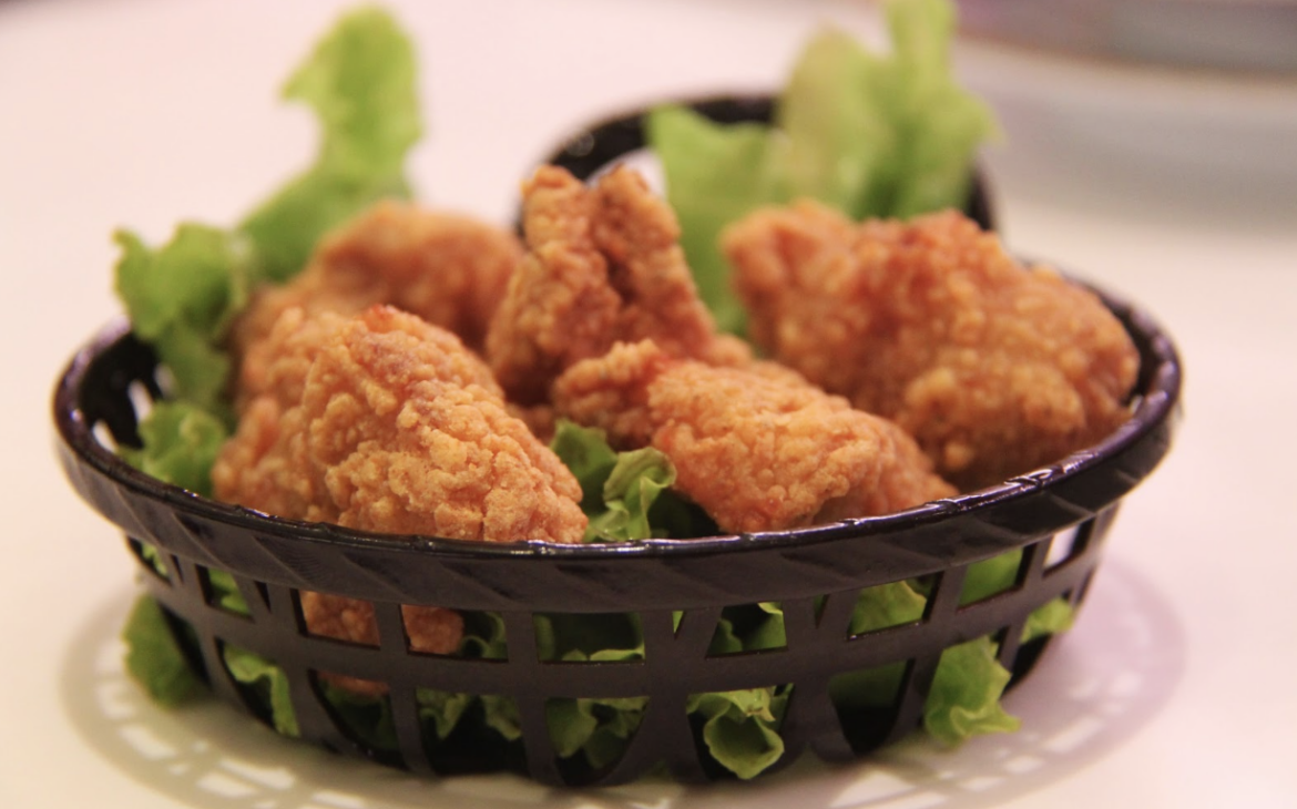 Bowl of Chicken Nuggets on a bed of lettuce