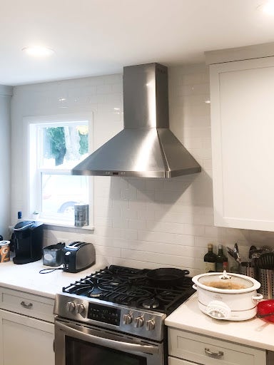 Modern Kitchen with White Tile Backsplash
