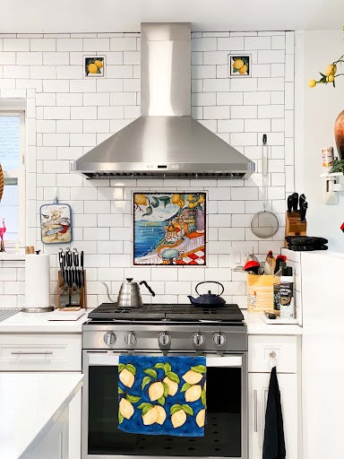 Bright Kitchen with High Quality Vent Hood