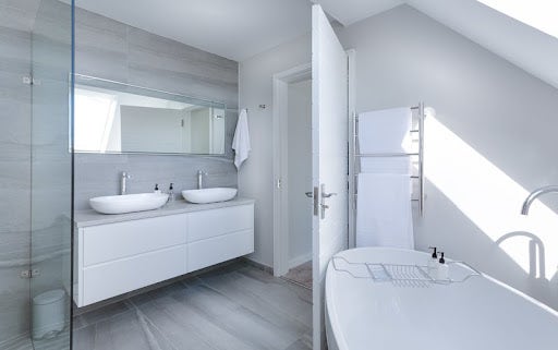 White Bathroom with a Tile Floor