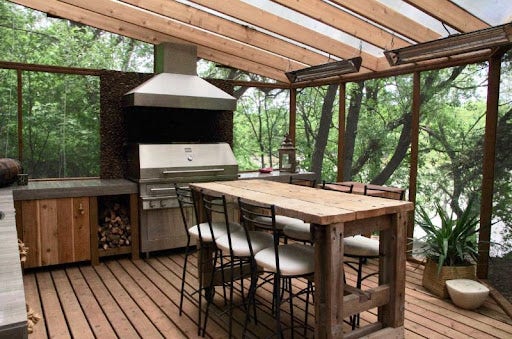Standard wood deck with pergola cover and island