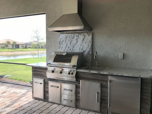 Natural stone pavers in outdoor kitchen