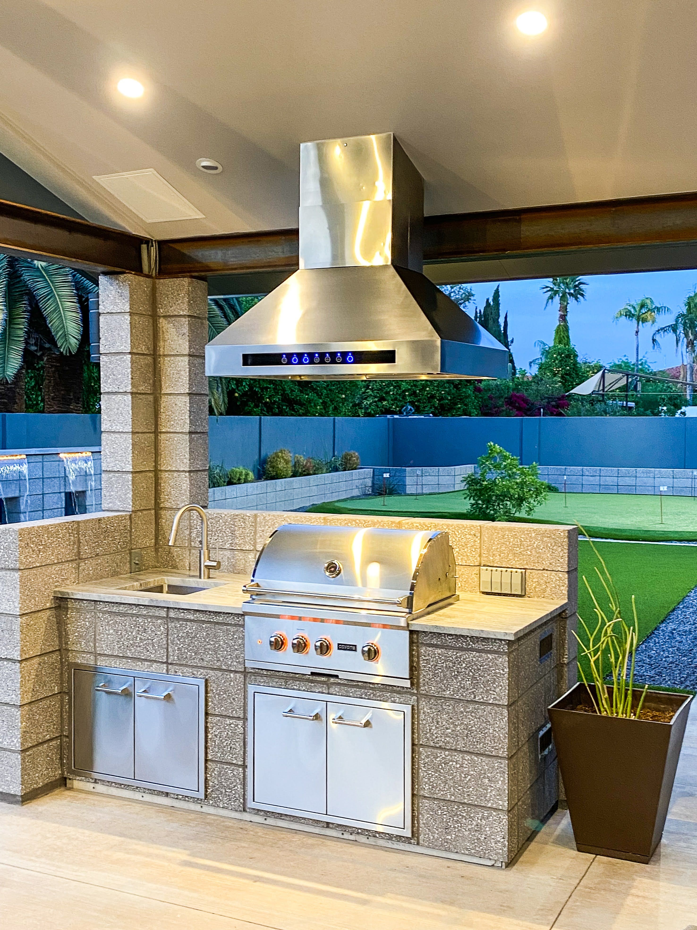 outdoor range hood over a single bbq grill