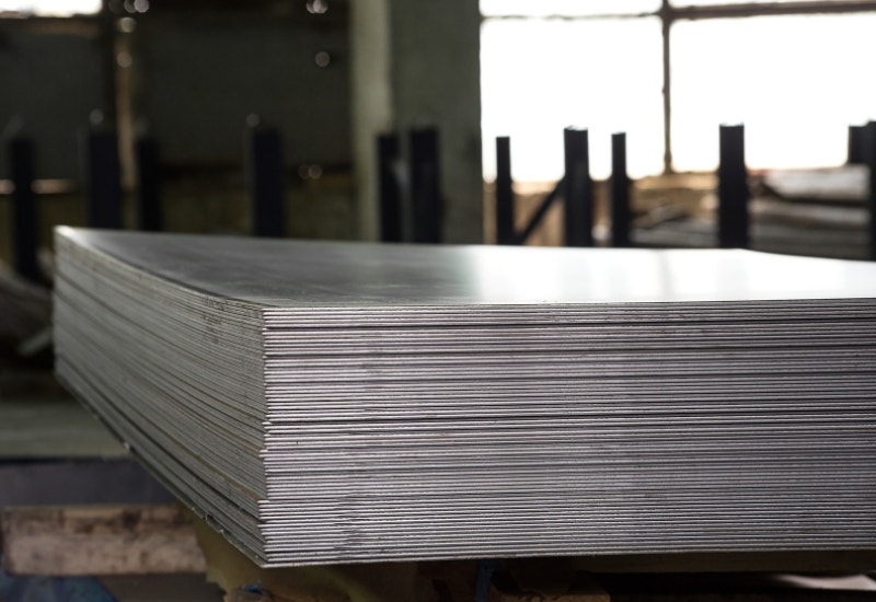 a stack of stainless steel sheets - Proline Range Hoods - prolinerangehoods.com 