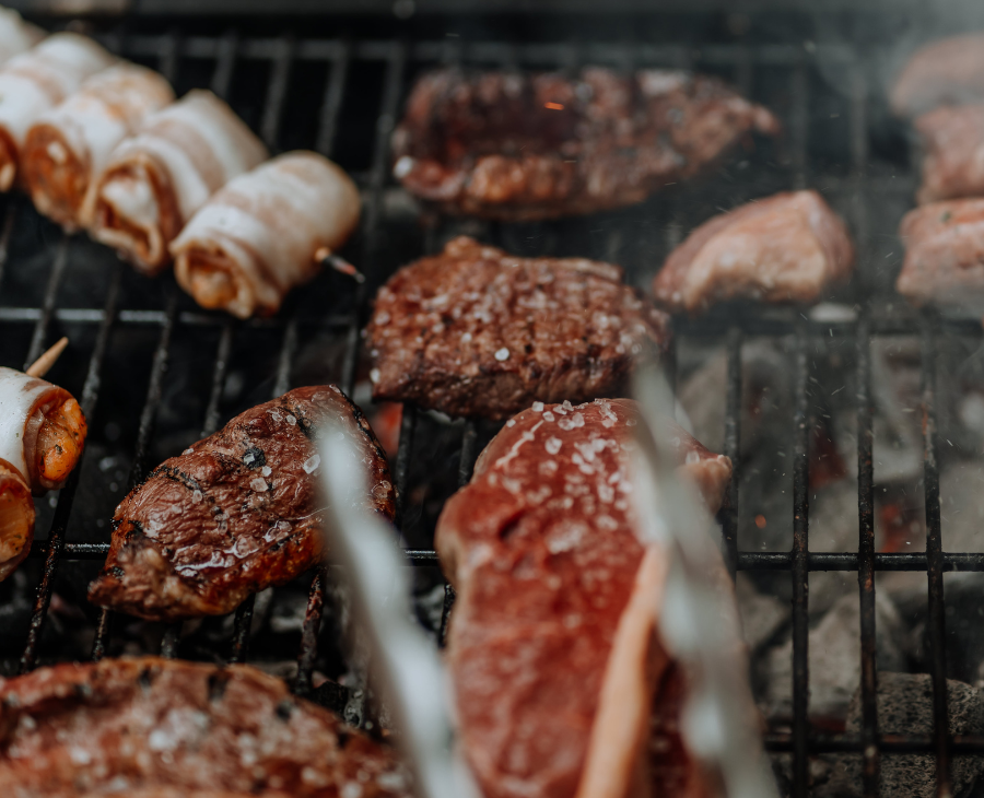 here is a grill full of meat at a Brazilian barbecue - Proline Range Hoods - prolinerangehoods.com 