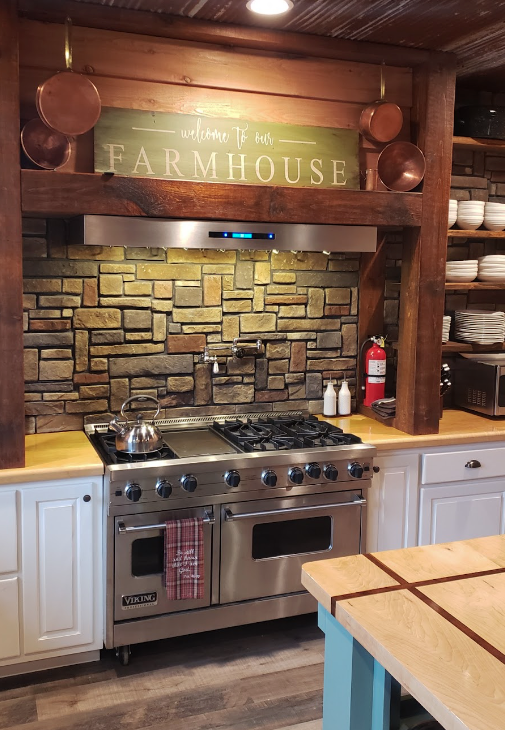Farmhouse Hood with Wooden Beam Supports